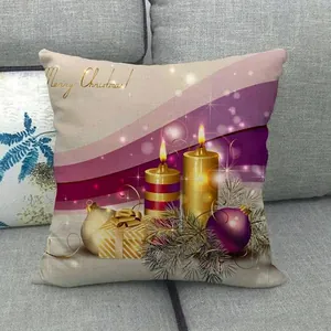 Detail of candy linen pillowcase with Merry Christmas candles and festive decor