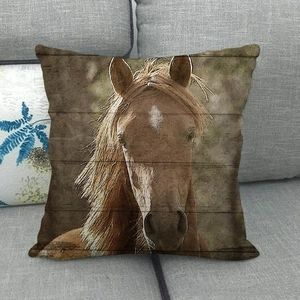 Detailed close-up of a rustic linen pillow cover with a realistic horse portrait print