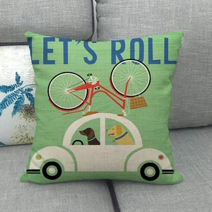 Linen pillow cover with retro car and dog prints featuring Blue Let's Roll text design