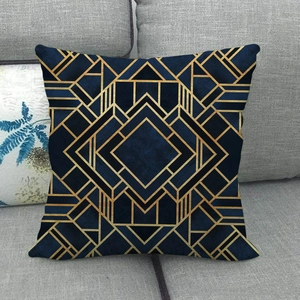 Art Deco style pillow case with golden geometric lines on navy blue linen fabric