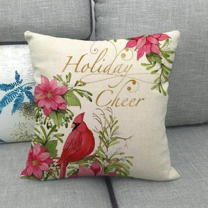 Detail of the linen texture on a Holiday Cheer pillowcase with cardinal and poinsettia