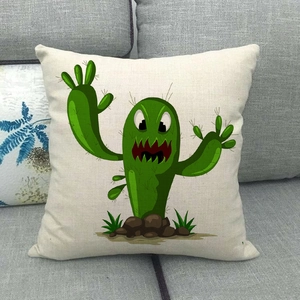 Détail de la housse de coussin en lin avec motif cactus et texture de tissu naturelle