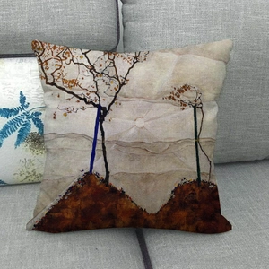 Artistic oil painting style autumn tree leaves linen cushion cover placed on a sofa