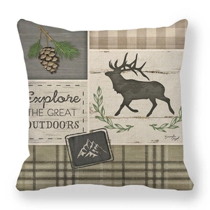 Detail showing the rustic linen fabric texture and outdoor moose print of this cushion cover