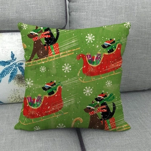Housse de coussin en lin avec un chien festif et un traîneau rouge sur fond vert