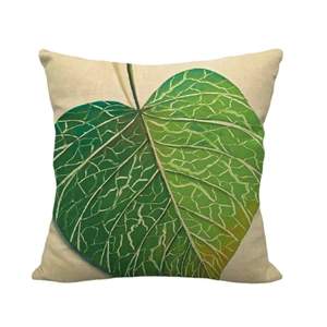 Housse de coussin en lin avec motif de feuilles peintes sur fond beige naturel