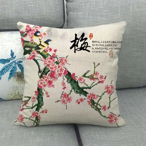 Linen blend plum blossom pillow cover on a gray sofa with traditional Chinese art