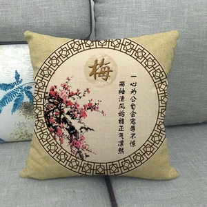 Detail of linen pillowcase featuring red plum blossoms and Chinese ink painting