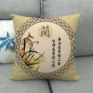 Close-up of linen pillow cover with traditional Chinese orchid painting and calligraphy.