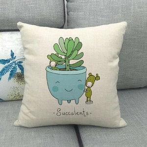 Detail of linen pillow cover with succulent illustration and cute cartoon characters