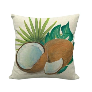 Linen throw pillow cover featuring tropical palm leaves and coconut print on cream fabric