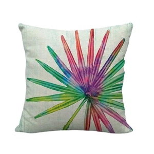 Linen pillow cover with colorful watercolor tropical leaf patterns on white background