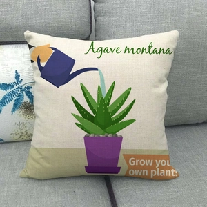 Detailed macro shot of linen pillowcase with agave plant print on a soft grey sofa