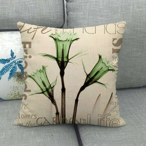Detailed texture of cotton linen pillow cover with X-ray flower print on a sofa