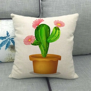 Detailed texture of linen cushion cover with cartoon cactus plant on a grey sofa