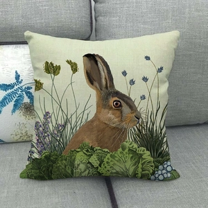 Easter rabbit throw pillow cover made of textured linen fabric with vivid floral prints