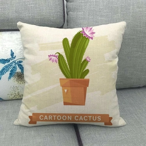 Close-up of linen pillowcase fabric texture with a cartoon cactus print on a grey sofa