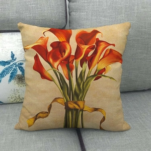 Detailed texture of linen pillowcase featuring a vintage orange flower bouquet design