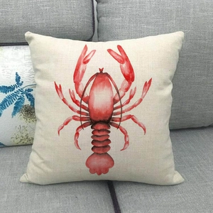 Détail de l'imprimé homard rouge aquarelle sur la housse de coussin en lin carré
