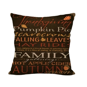 Rustic brown Thanksgiving linen pillow cover with orange maple leaves and autumn typography