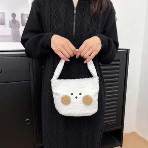 Plush white bear shoulder bag made of soft sherpa fleece with cute cartoon animal face