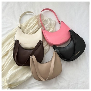 Minimalist crescent hobo bags shown in multiple colors with matte PU leather finish