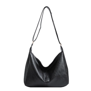 Classic black leather hobo shoulder bag with adjustable strap and metal ring details