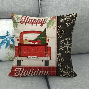 Linen Christmas pillow cover featuring a red vintage truck and festive Happy Holiday print