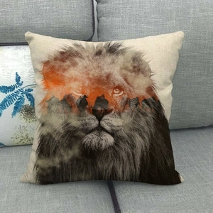 Artistic lion head throw pillow cover with animal silhouette on a modern gray sofa