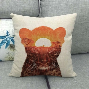 Detail of square cotton linen pillowcase featuring leopard and African savanna print
