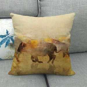 Detailed texture of cotton linen cushion cover featuring watercolor bison wildlife print