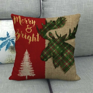 Christmas reindeer plaid linen pillowcase with Merry and Bright text on a grey sofa