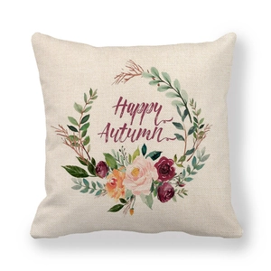 Detail of Happy Autumn watercolor floral wreath printed on linen textured pillow cover