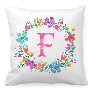 Detail of floral wreath pillowcase with watercolor letter F printed on soft peach skin