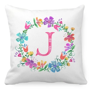 Detailed view of square pillowcase with watercolor floral wreath and pink letter J