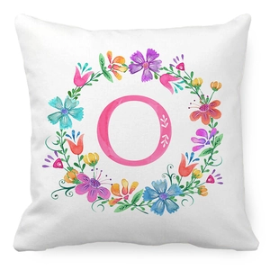 Detail of soft square pillowcase with watercolor floral wreath and pink letter O