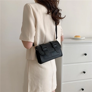 Minimalist black square crossbody bag for women with double buckles and matte finish