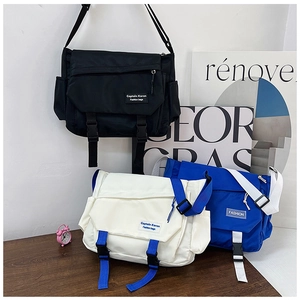 Three colors of waterproof nylon messenger bags with double buckles and side pockets