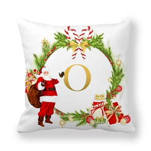 Detailed view of Christmas pillowcase with letter O print and festive wreath design