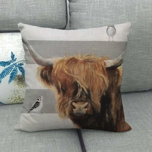 Detail showing the linen texture and high-quality highland cow print on the square pillow case