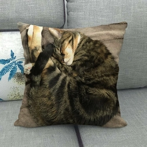 Detailed texture of cotton linen pillow cover featuring a sleeping tabby cat print