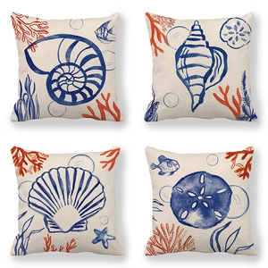 Set of four linen cushion covers featuring blue and orange sea shells and starfish prints
