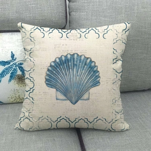 Minimalist square throw pillow with blue seashell print and vintage French script