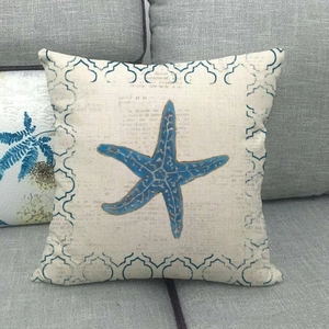 Minimalist summer ocean style cushion cover featuring a navy starfish and blue border