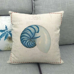 Minimalist square throw pillow featuring a blue nautilus shell print on linen fabric