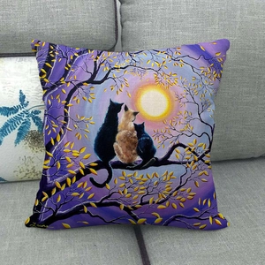Detailed texture of square linen pillowcase with cats and moon illustration on a sofa