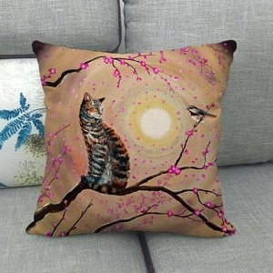 Detailed linen texture of a decorative pillow case with a painted cat and cherry blossoms