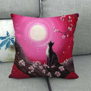 Detailed texture of linen pillow cover showing hand-painted cat and cherry blossoms