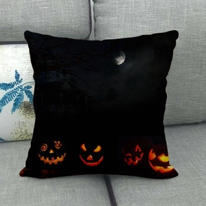 Macro detail of Halloween linen pillowcase featuring Jack-o-lanterns and moonlit castle