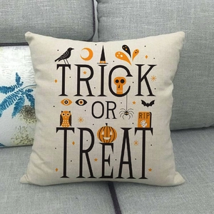 Close-up of Halloween linen pillowcase with Trick or Treat text and festive illustrations